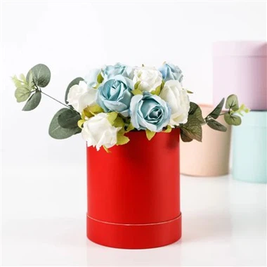 Cajas de regalo con forma de flores redondas y tapas